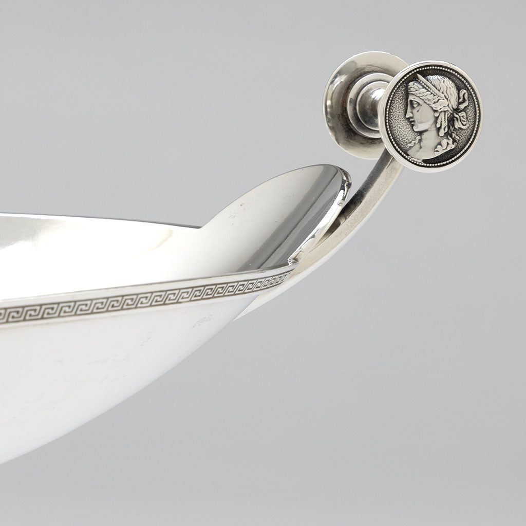 Handle medallion detail of Gorham Manufacturing Company Coin Silver Medallion Centerpiece Bowl, retailed by Tiffany &amp; Co., c. 1865