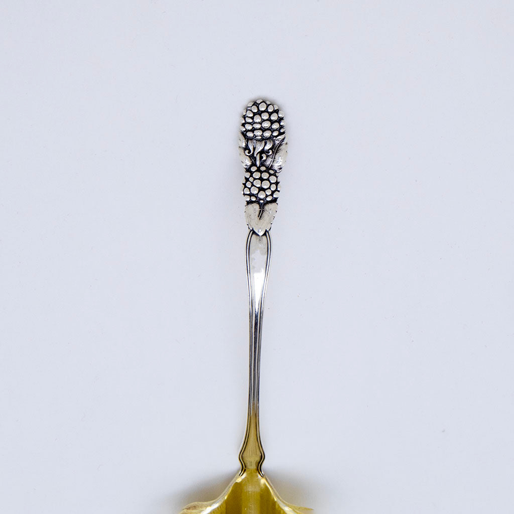 Handle detail of Tiffany &amp; Co. Blackberry Pattern Antique Sterling Silver Cream Ladle, NYC, 1891-1902