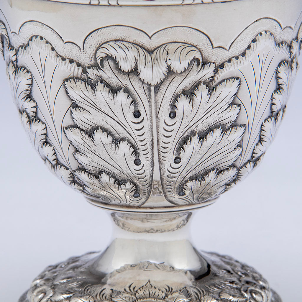 Leves details on Samuel Kirk 11oz Silver Armorial &#39;Gilmor&#39; Ewer, Baltimore, c. 1840, bearing the crest of Stone