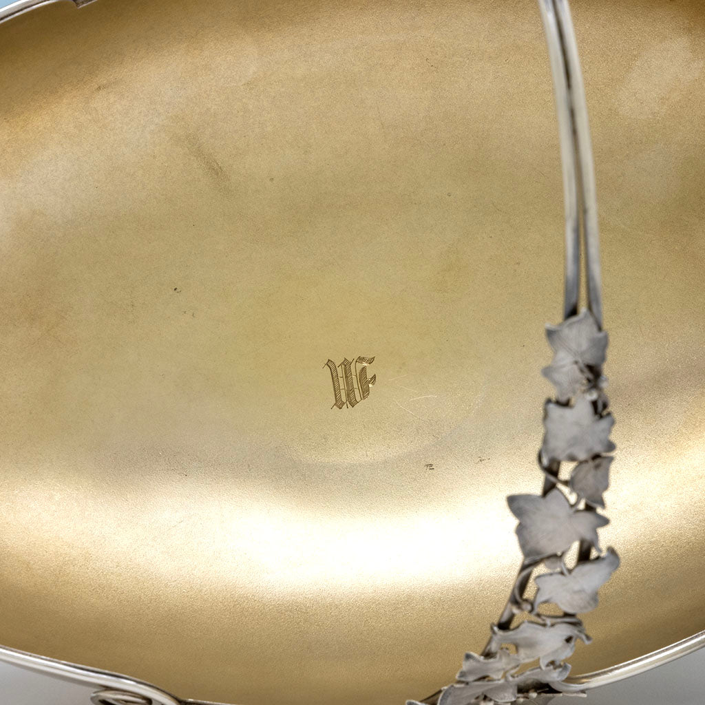 Interior monogram on Gorham Aesthetic Antique Sterling Silver Cake Basket, Providence, RI, 1872