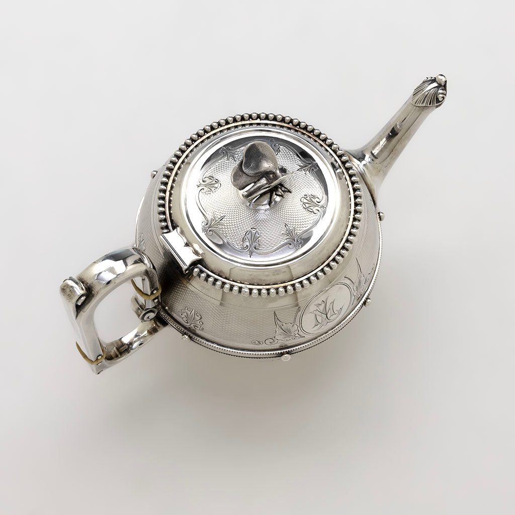Pot cover to Gorham Antique Coin Silver Butterfly Tea Set, Providence, RI, c. 1860