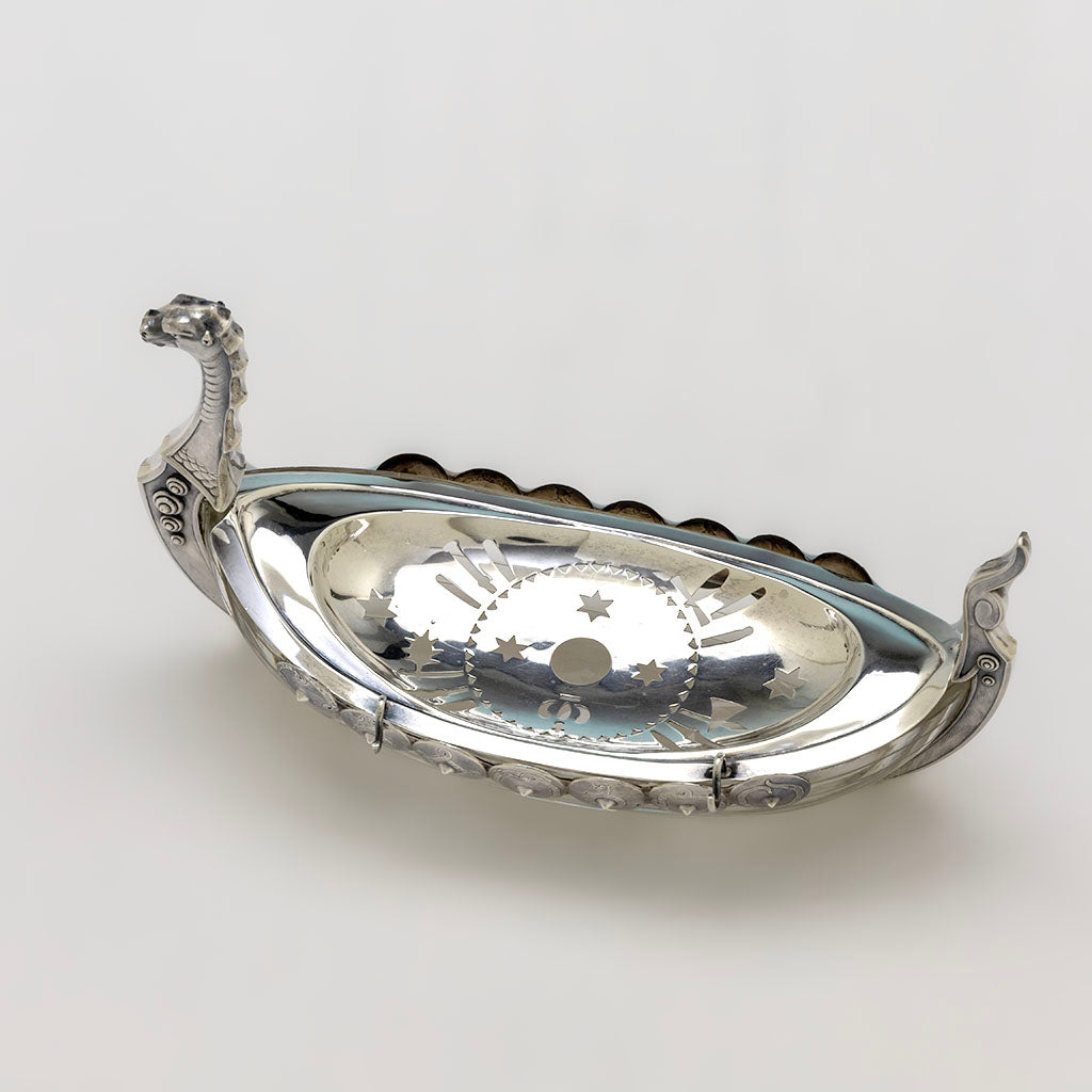 Top view of JE Caldwell(retailer) American Aesthetic Movement Sterling and Glass Viking Ship Form Butter Dish, c. 1880s