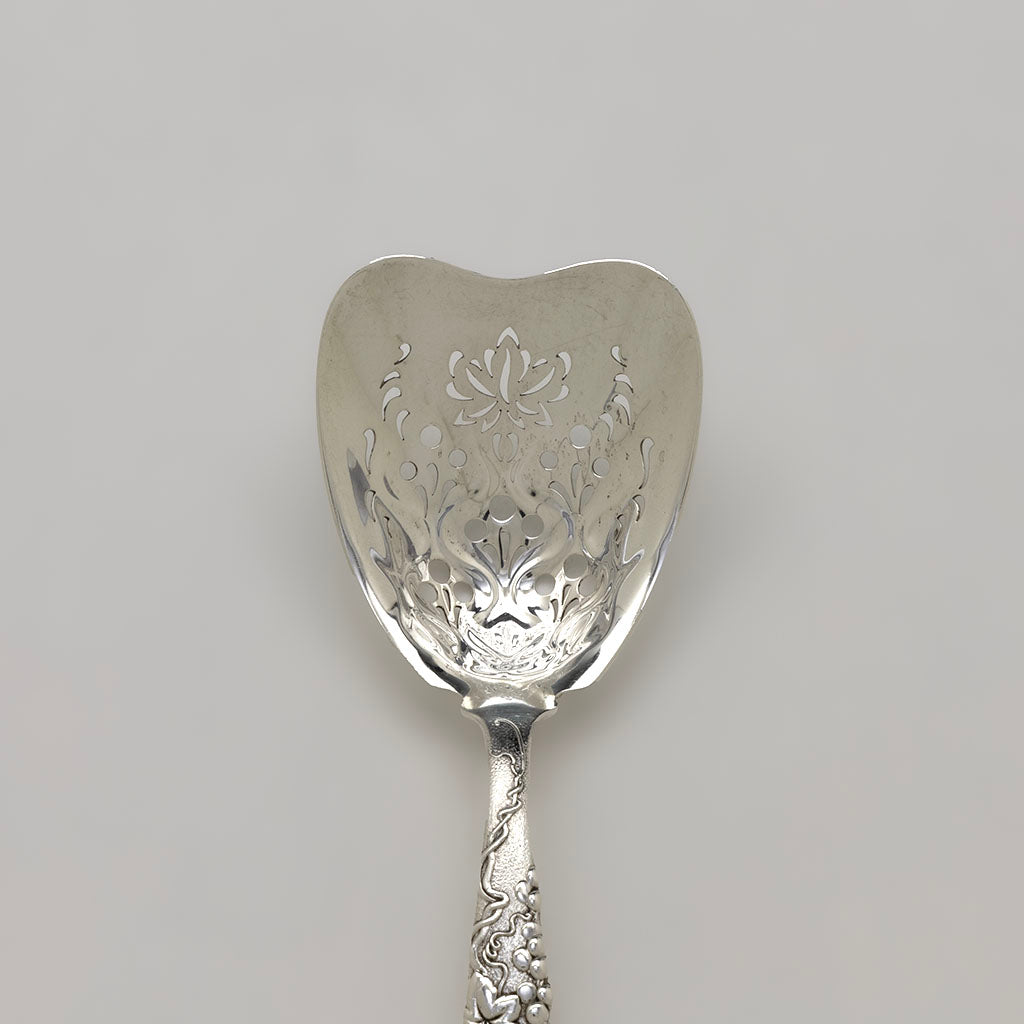 Pierced bowl of Tiffany &amp; Co Antique Sterling Silver &#39;Grapevine&#39; Pattern Ice Spoon, NYC, NY, c. 1870s