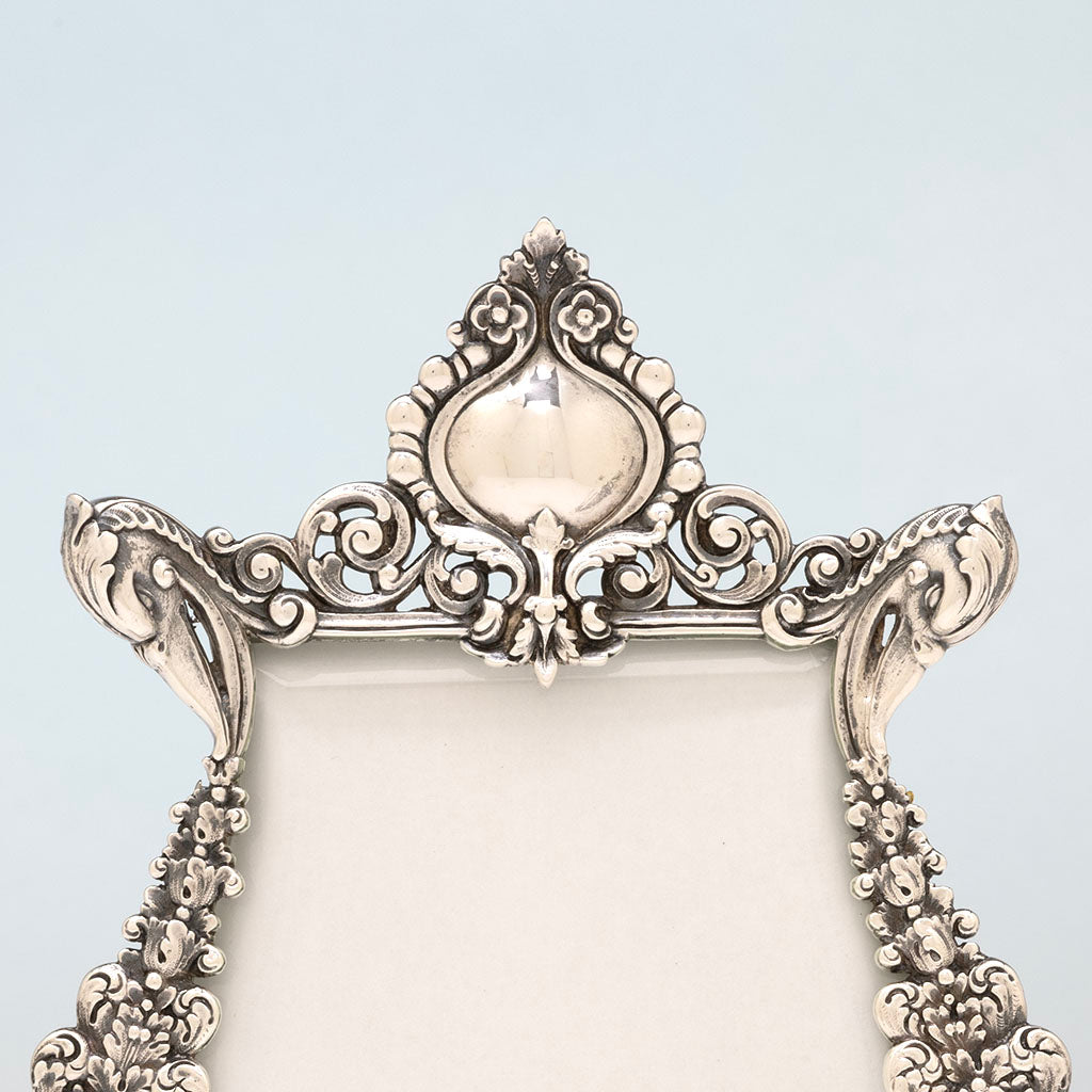 Swan details on Tiffany &amp; Co. Antique Sterling Silver Floral Picture Frame with Swans, NYC, NY, c. 1894