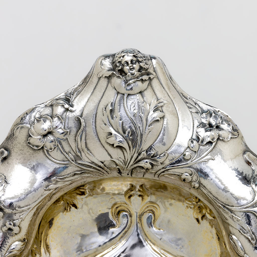 Cherub handle 1 of Gorham 1900 Paris Exposition Martelé Silver Centerpiece, Providence, RI, 1899