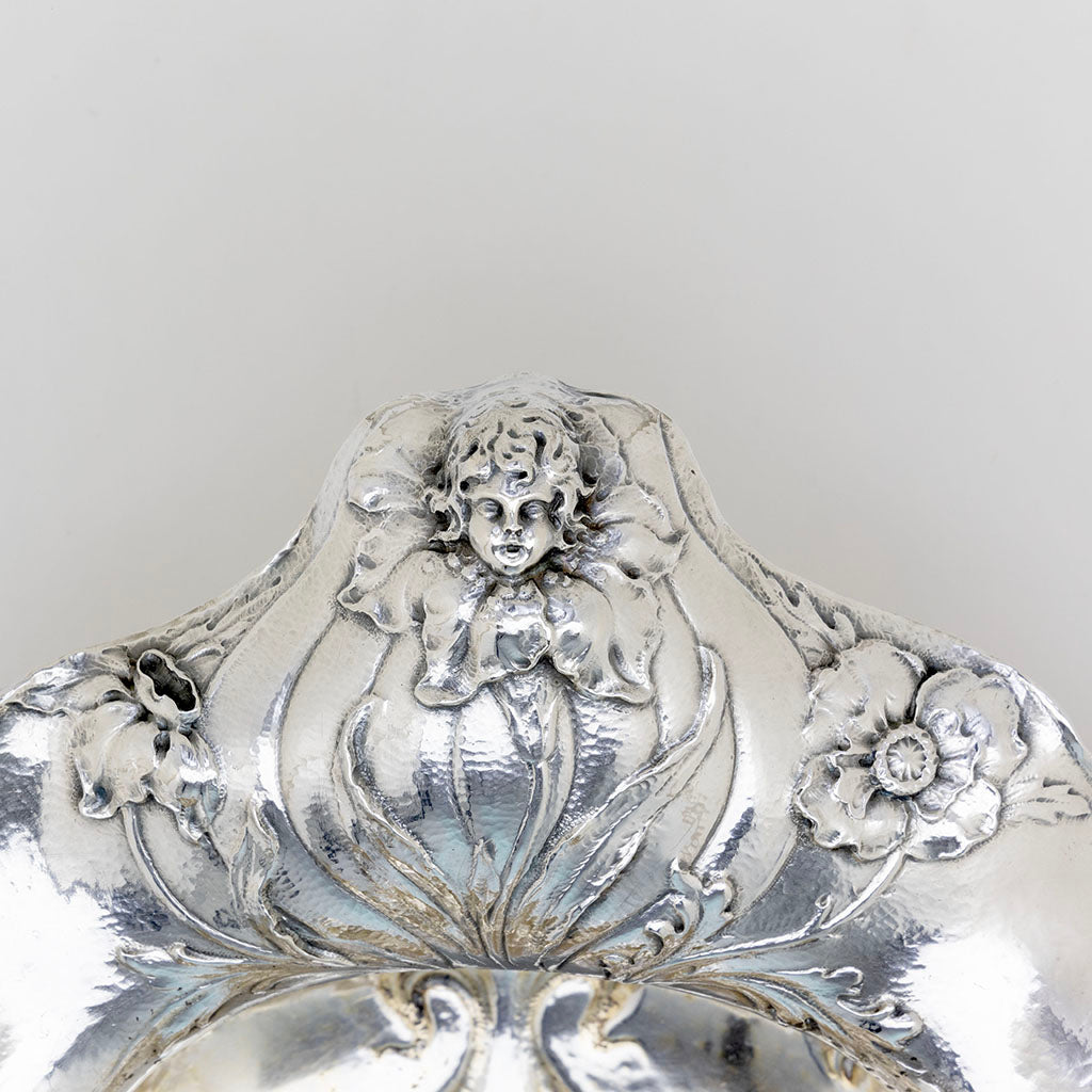 Cherub handle 2 of Gorham 1900 Paris Exposition Martelé Silver Centerpiece, Providence, RI, 1899