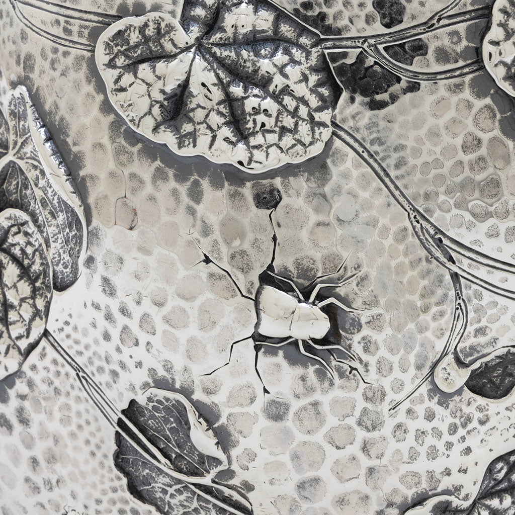 Emerging beetle on Dominick &amp; Haff Sterling Intaglio Chased Aesthetic Movement Pitcher, 1883