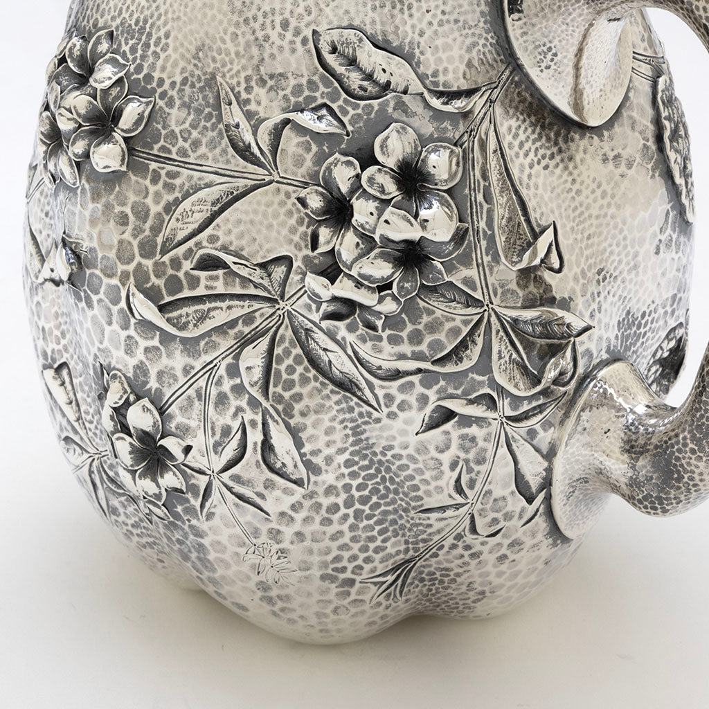 Flower detail on Dominick &amp; Haff Sterling Intaglio Chased Aesthetic Movement Pitcher, 1883