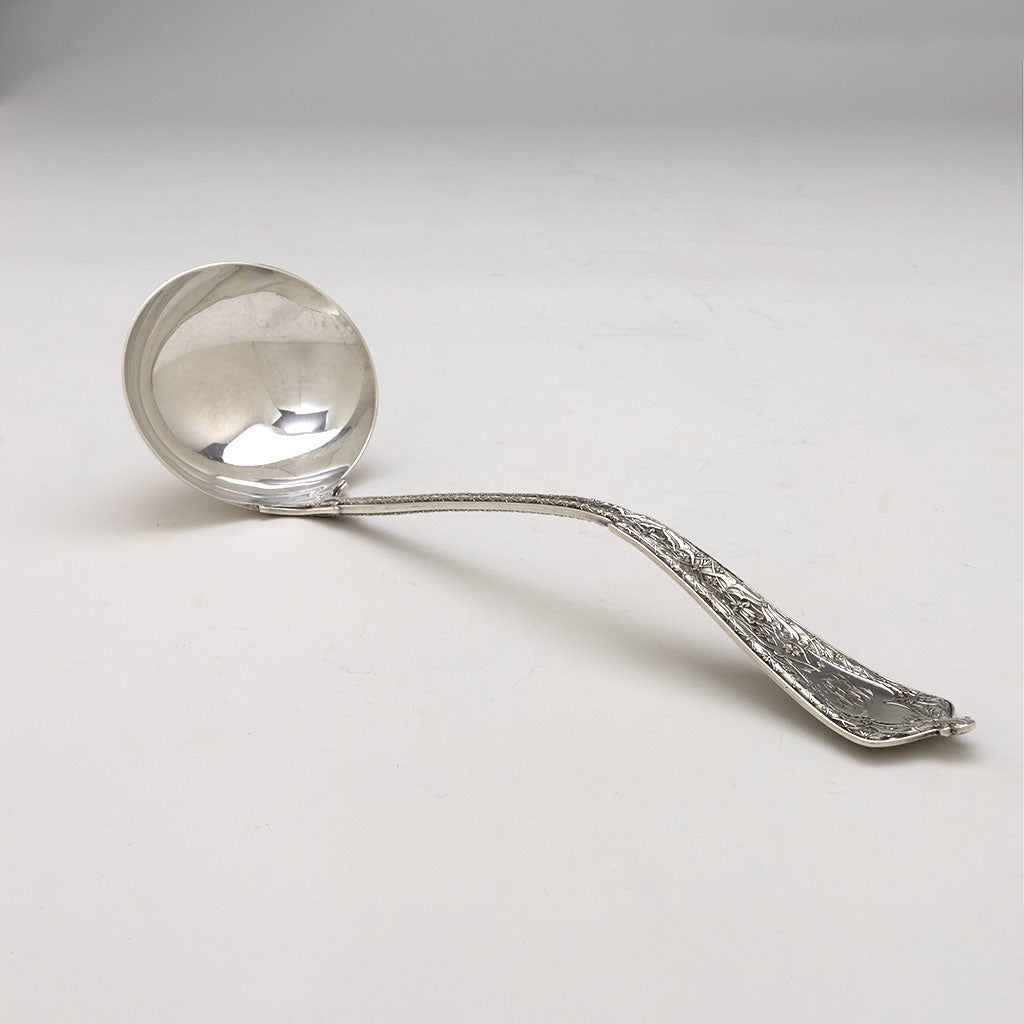 Side view of Tiffany &amp; Co 'Persian' Pattern Antique Sterling Silver Soup Ladle, 1875-91
