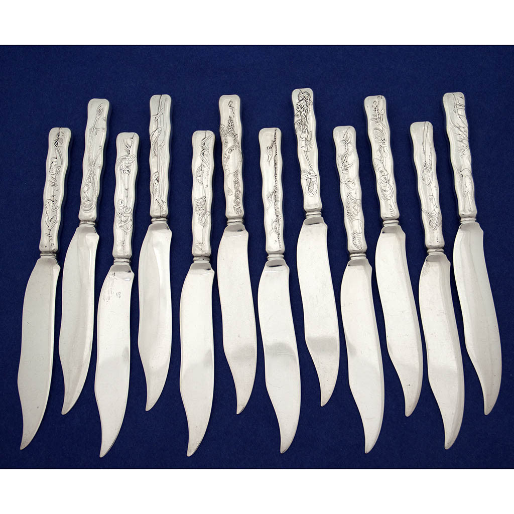 Tiffany & Co 'Lap Over Edge' Pattern 12 Antique Sterling Silver Fish Knives, New York City, c. 1910