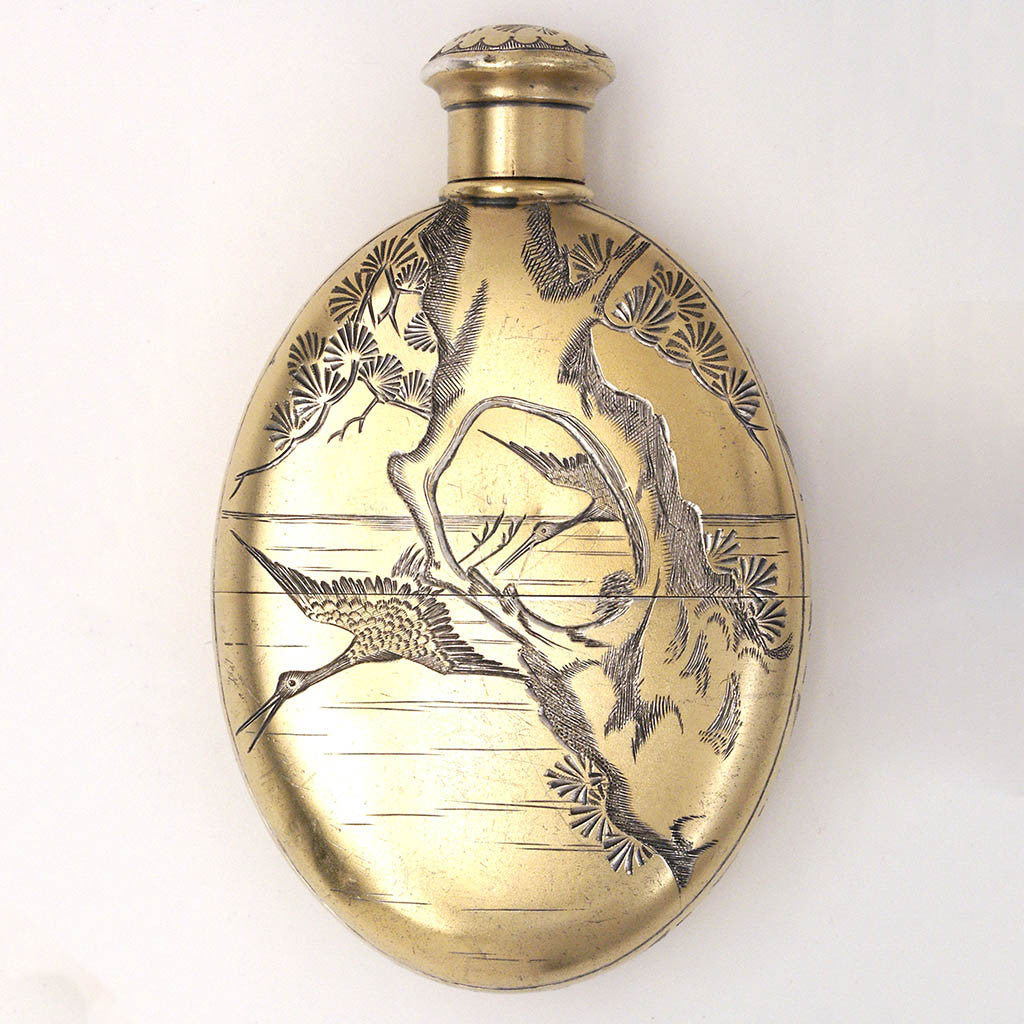 A vintage German 9ct solid gold Swastika pendant with an