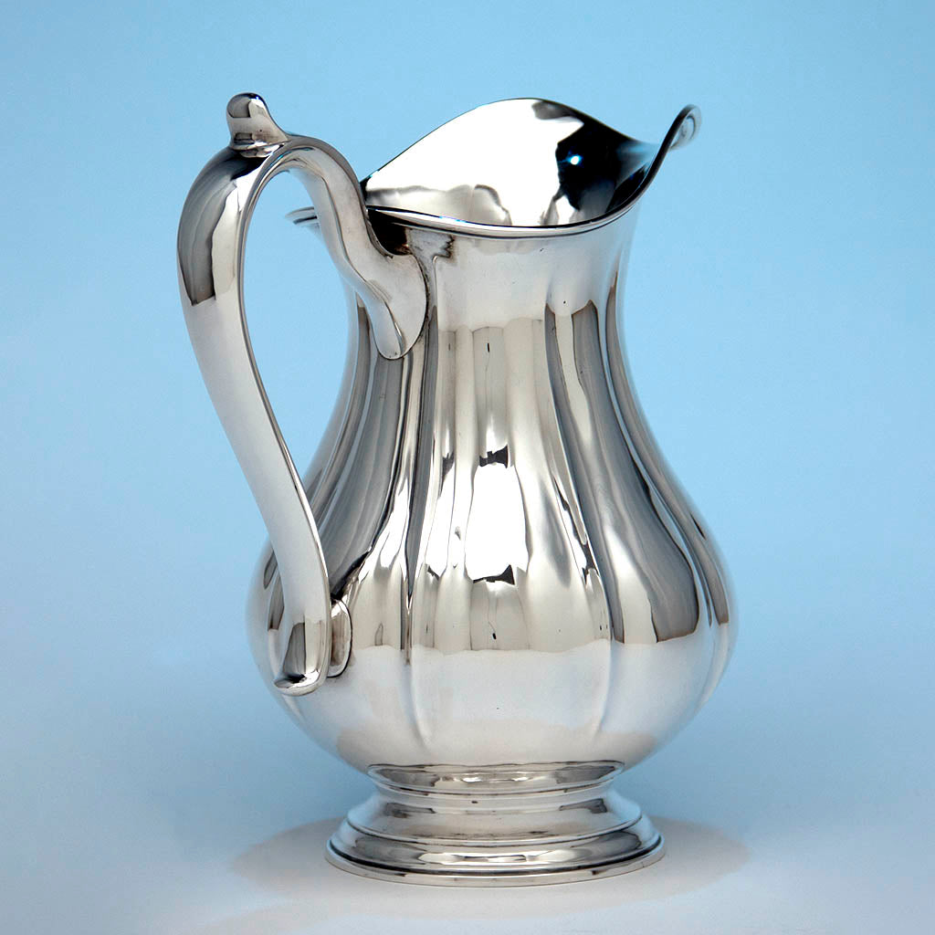 Angle view of Arthur Stone Associates Arts &amp; Crafts Sterling Silver &#39;Fluted&#39; Water Pitcher, c. 1930&#39;s
