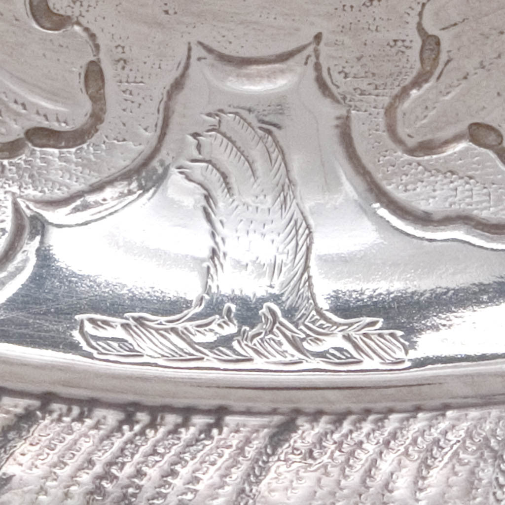 Crest on Peter Taylor - The Breton Family George II Sterling Silver English Rococo Two Handled Cup and Cover, London, 1741/42, bearing the arms of Breton for Eliab Breton of Norton Hall, Norton, Northamptonshire and Forty Hall, Enfield, Middlesex