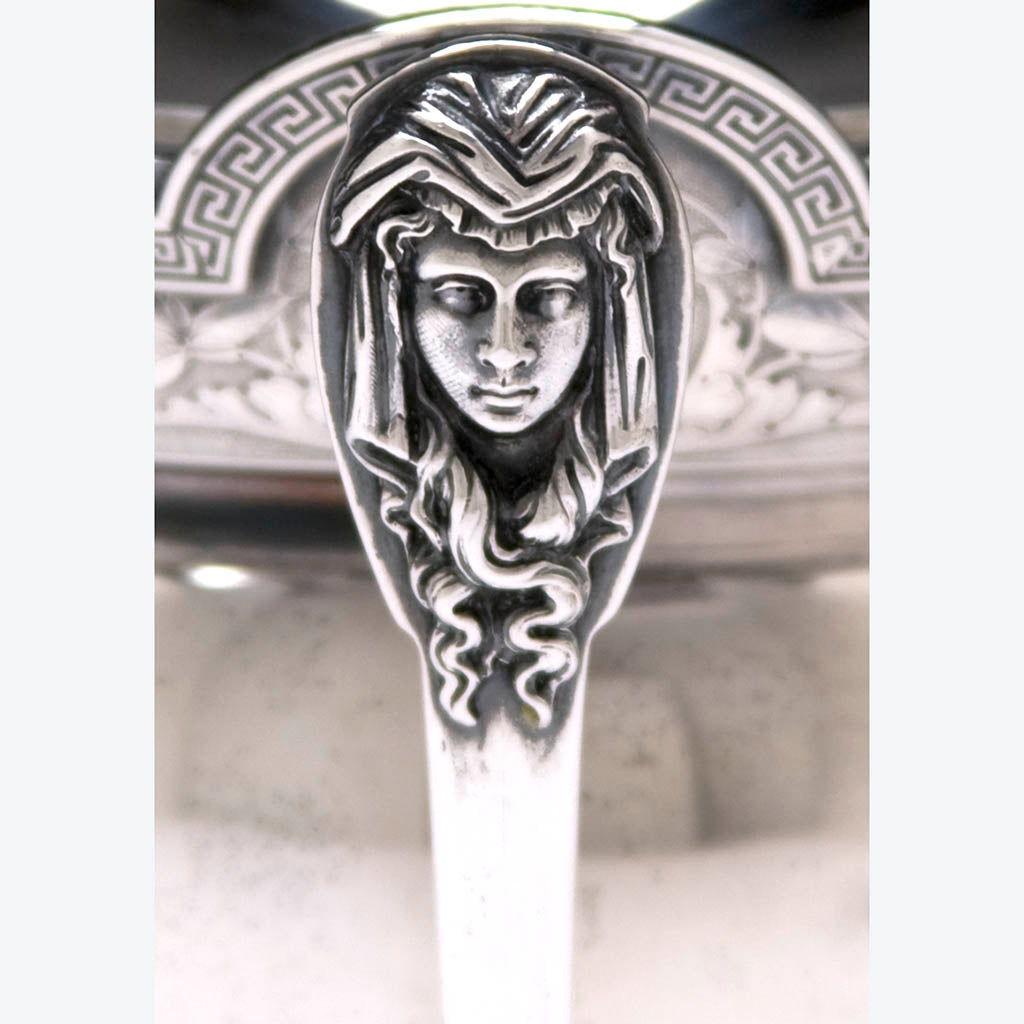 Handle detail of the Gorham &quot;Medallion&#39; Pattern Antique Coin Silver Coffee or Tea Set, c. 1865