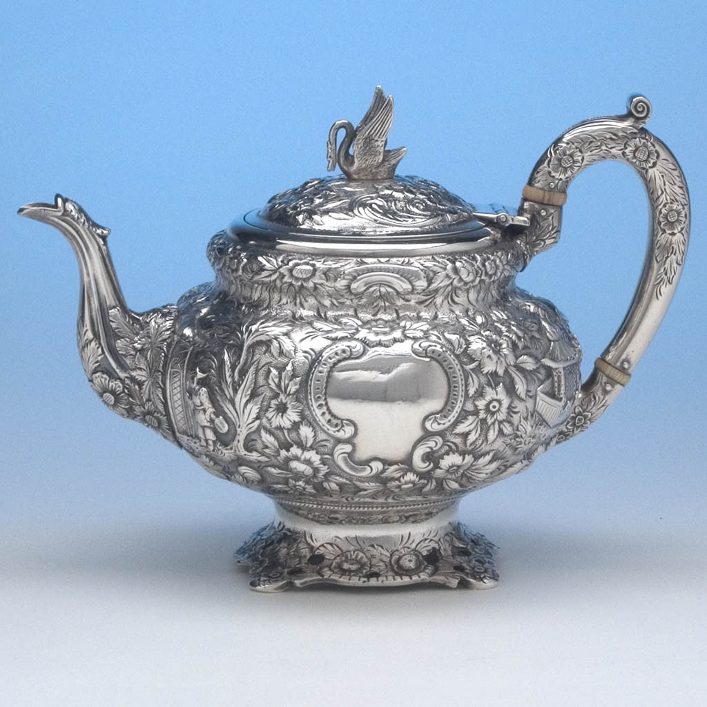 Reverse of Samuel Kirk 11oz Silver Repoussé Chinoiserie Teapot, c. 1834-46, bearing the crest and arms of Maryland Governor Thomas Swann (1809-1883)