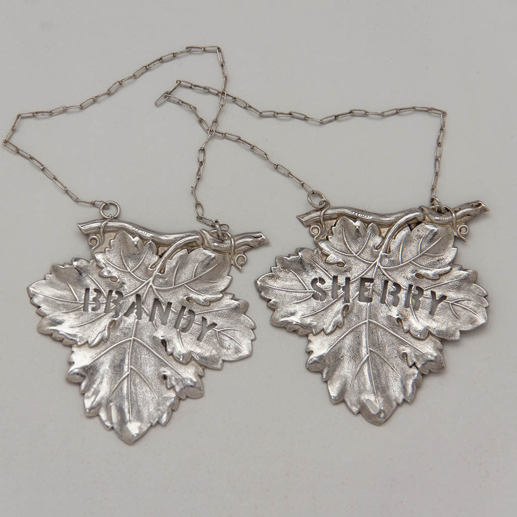 Pair of Eoff & Shepard Rare Coin Silver Decanter Labels, New York City, 1852-60