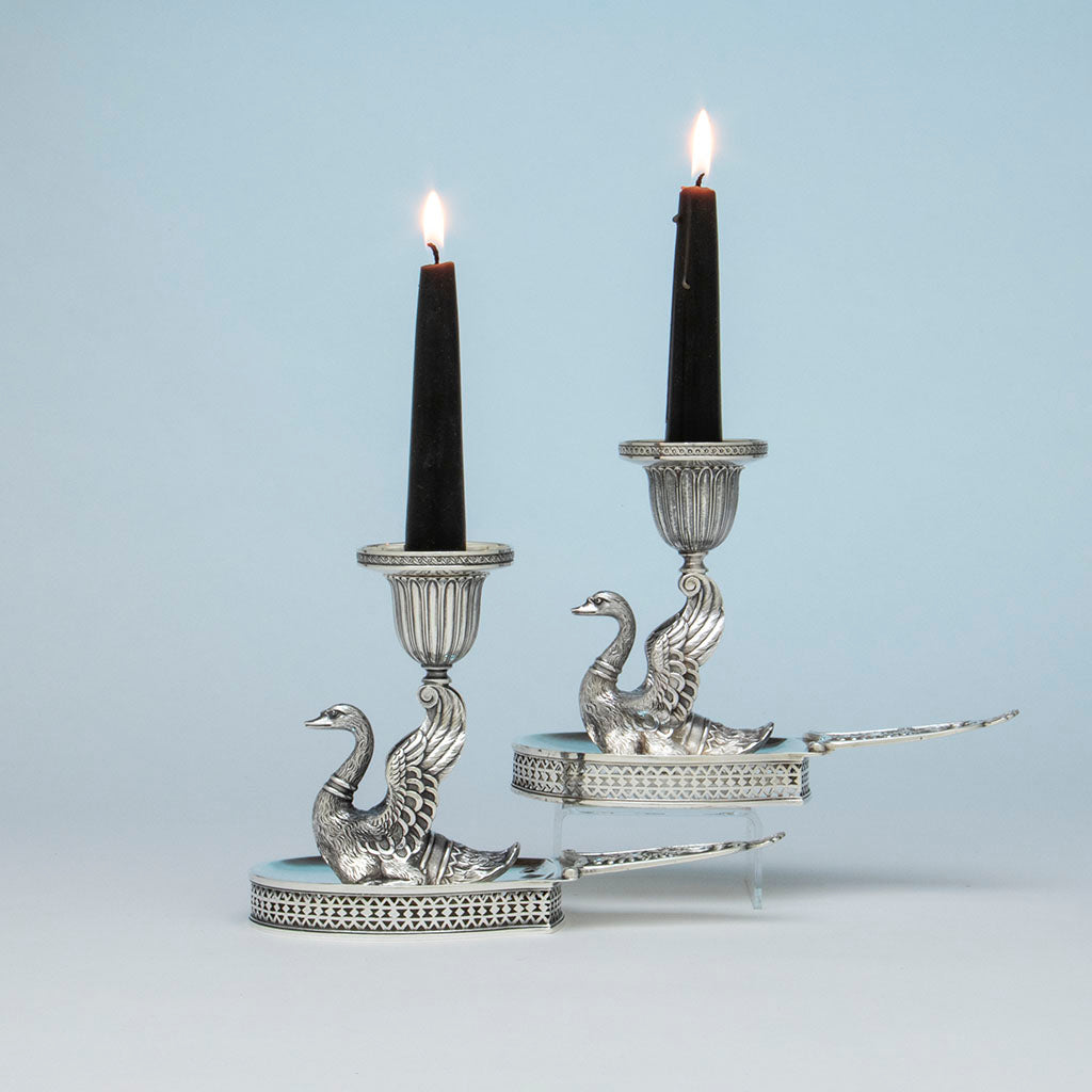 J.E. Caldwell Antique Sterling Silver Swan Candlesticks, Philadelphia, PA, c. 1865 with lit candles