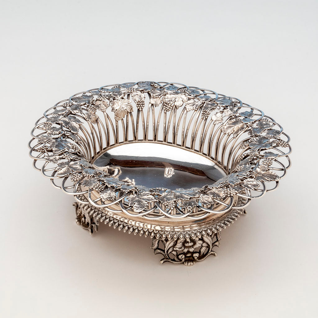 Angle view of Gale, Wood and Hughes Antique Coin Silver Footed Basket, NYC,. NY, 1833-45