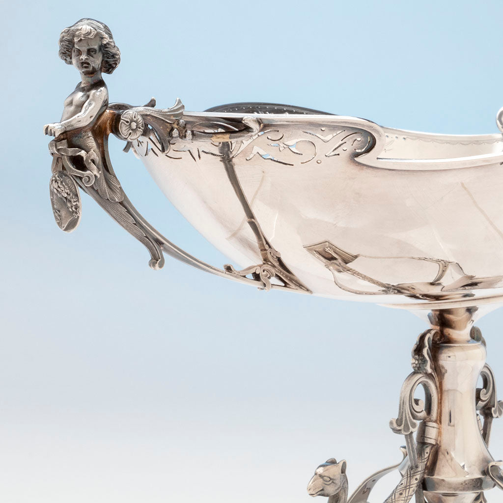 Cherub holding medallion on Gorham Pair of Sterling Silver Figural Medallion Berry bowls, Providence, RI, 1869