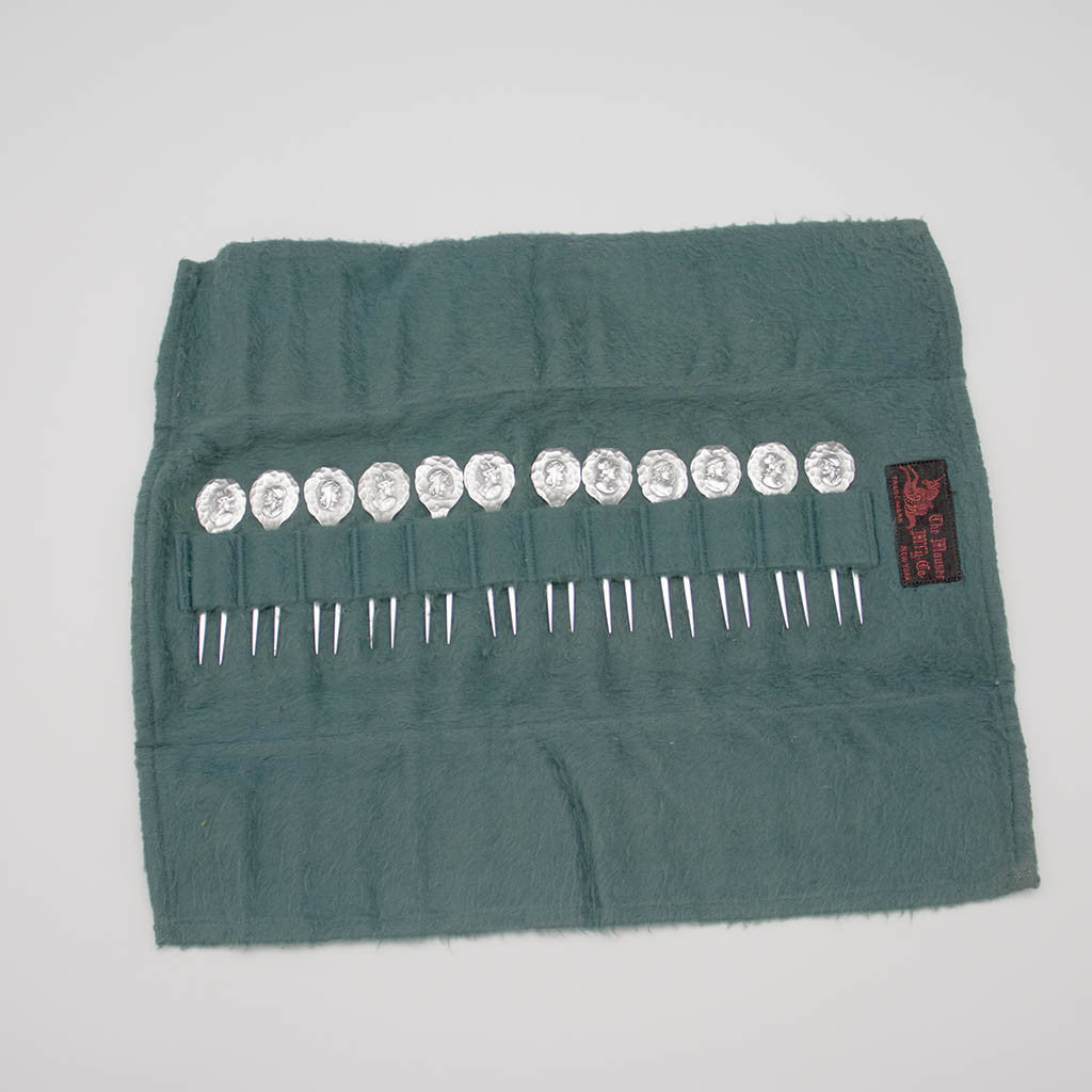 Felt bag with Shiebler &#39;Homeric&#39; or &#39;Medallion&#39; Antique Sterling Silver Cherry or Fruit Picks - set of 12, New York City, c. 1890&#39;s