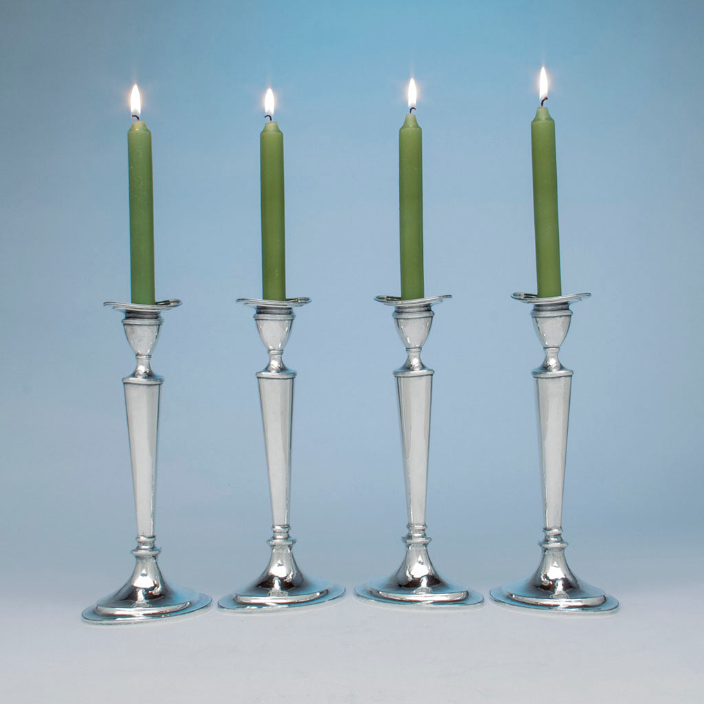 Angle view of Arthur Stone Set of 4 &#39;Scrooby Oval&#39; Arts and Crafts Sterling Candlesticks, Gardner, MA, c. 1920