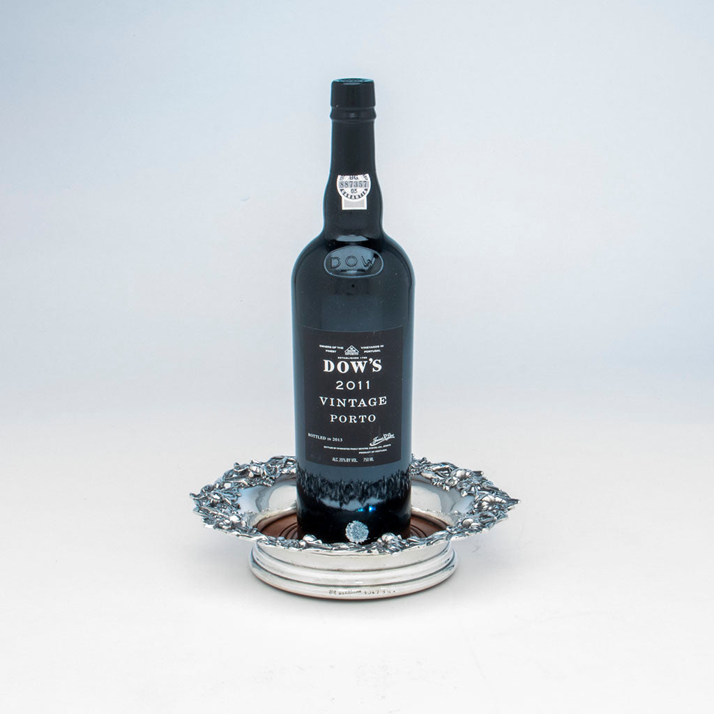 Bottle with Redlich &amp; Co Antique Sterling Silver Wine Coaster, NYC, c. 1900
