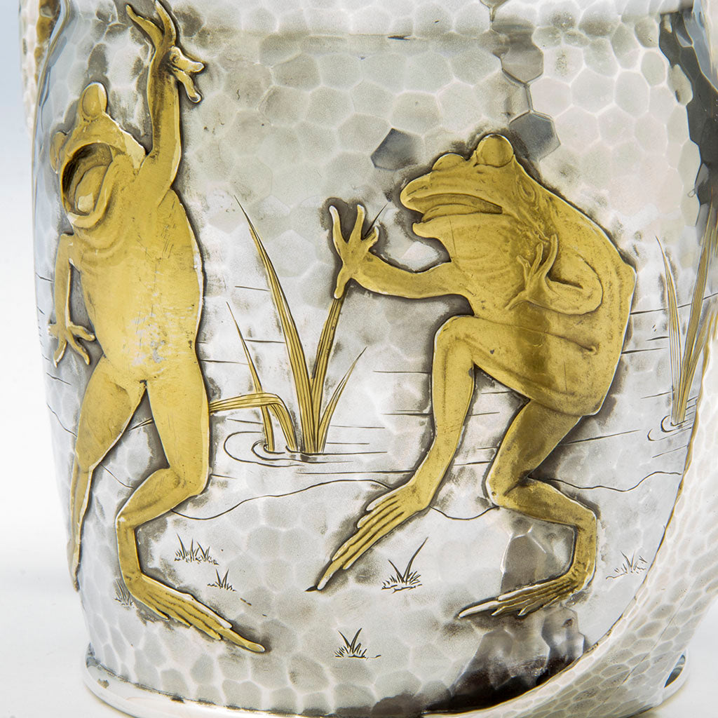 Detail of dancing frogs on the Tiffany &amp; Co. Antique Sterling Silver Reveling Frogs Two-handled Cup, NYC, NY, c. 1880