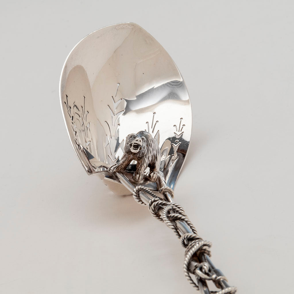 Bear baring teeth on Gorham Antique Sterling Silver Original Ice Spoon, Providence, RI, 1872 