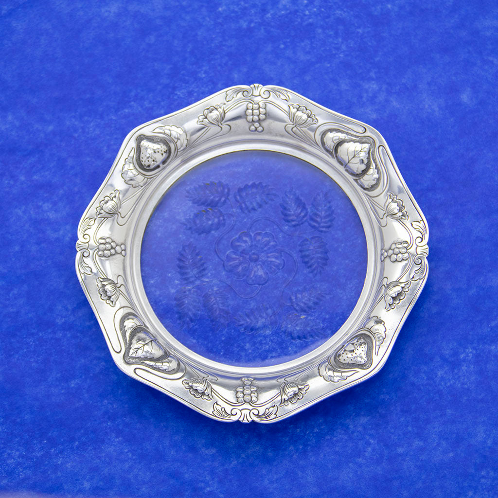 Gorham Athenic Antique Sterling Silver and Glass Dessert Plates, Providence, RI, c1903 displayed on blue paper