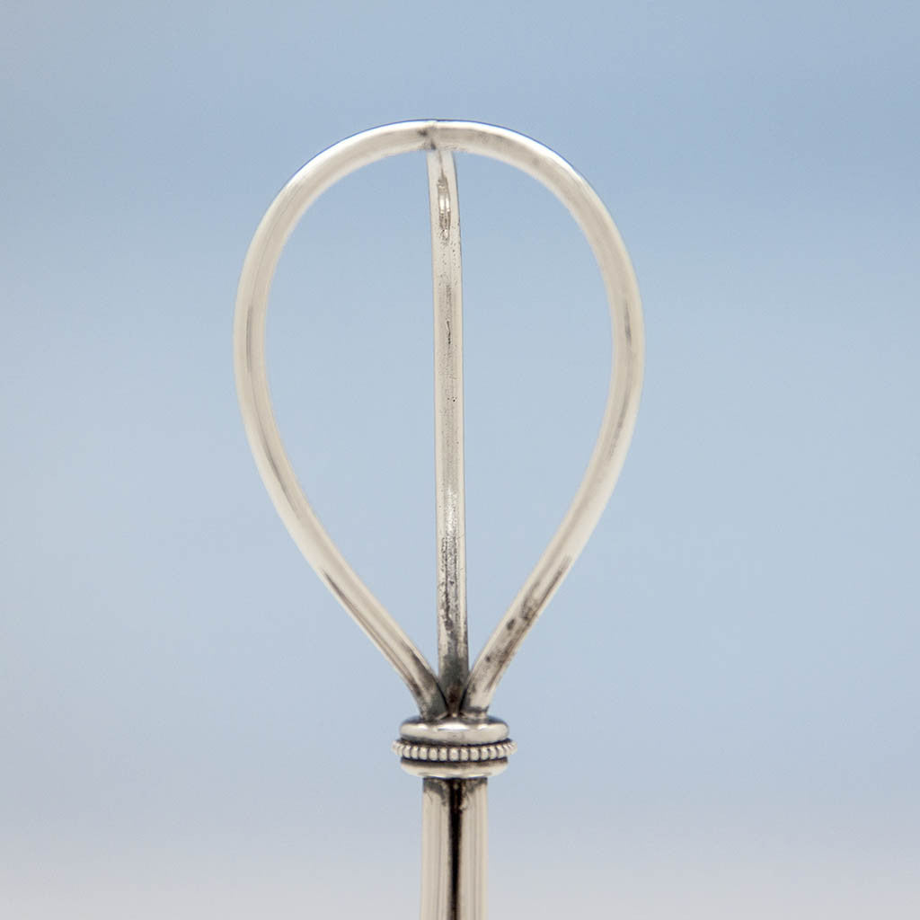 Handle detail of the Gorham Antique Sterling Silver Cake Basket, Providence, RI, 1870, retailed by Bailey &amp; Co., Philadelphia