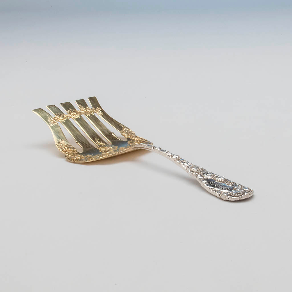 Angle view of the Durgin &#39;Chrysanthemum Antique Sterling Silver Asparagus Server, Concord, NH, c. 1890&#39;s