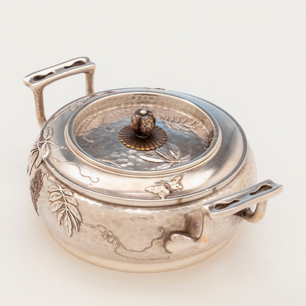 Handles to sugar bowl of Tiffany and Co Sterling and Other Metals Téte Téte Set, NYC, NY, c. 1878