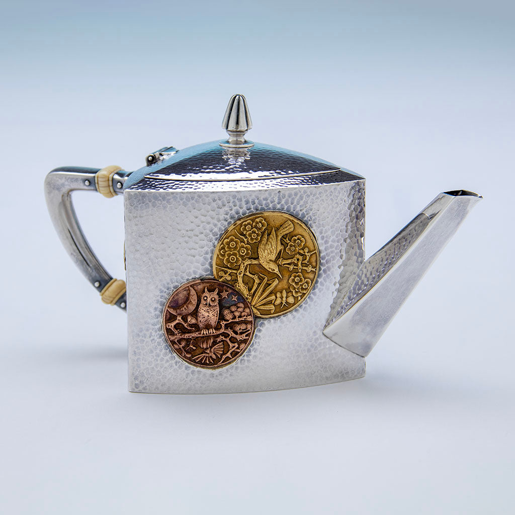 Gorham medallions on Gorham Antique Sterling &amp; Other Metals Tête-à-Tête Tea Set, Providence, RI, 1880