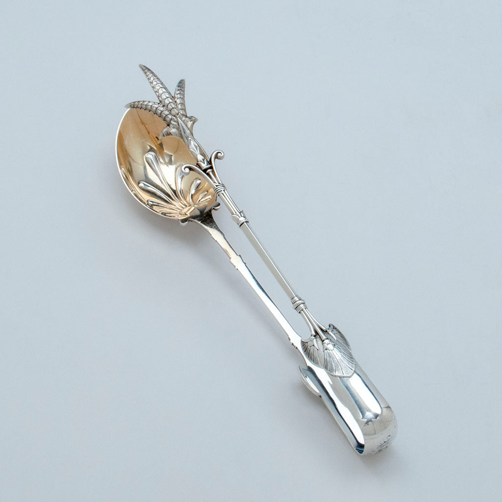 Top view of Gorham &#39;Lotus&#39; Pattern Antique Sterling Silver Salad Tongs, Providence, RI, c. 1870