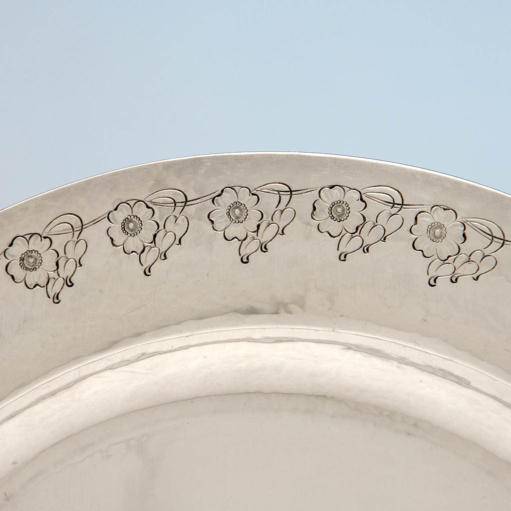 Decoration detail on the The Kalo Shop Arts &amp; Crafts Sterling Chased Presentation Service Plates, Chicago, IL, 1915 set of 12