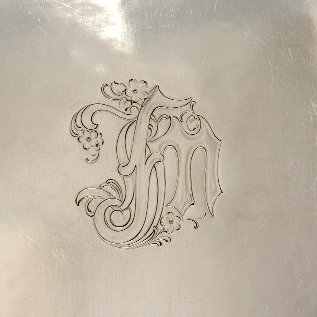 Monogram detail on the The Kalo Shop Arts &amp; Crafts Sterling Chased Presentation Service Plates, Chicago, IL, 1915 set of 12