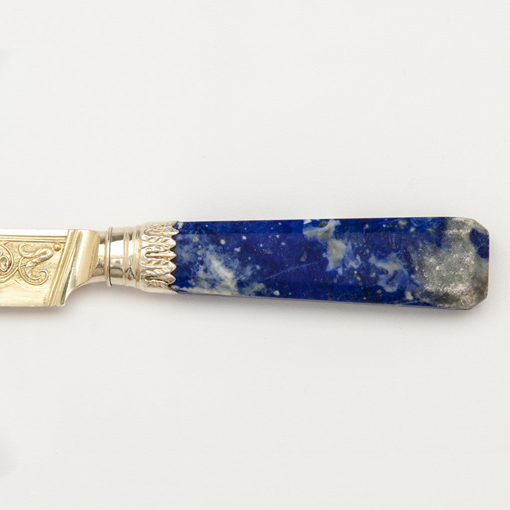 Handle to Francis Higgins: Judaica: English Antique Sterling Silver Gilt and Lapis Lazuli Dessert, Fish or Fruit Service, London, 1873/74 bearing the crest of Sassoon