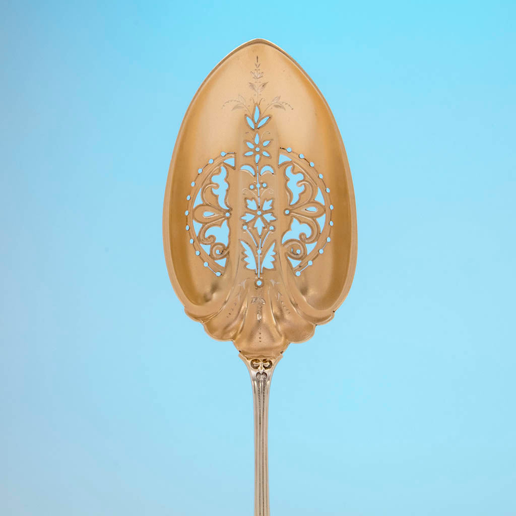 Pierced bowl to John Wendt &#39;Ribbon&#39; Pattern Antique Sterling Silver Ice Spoon, NYC,  c. 1875